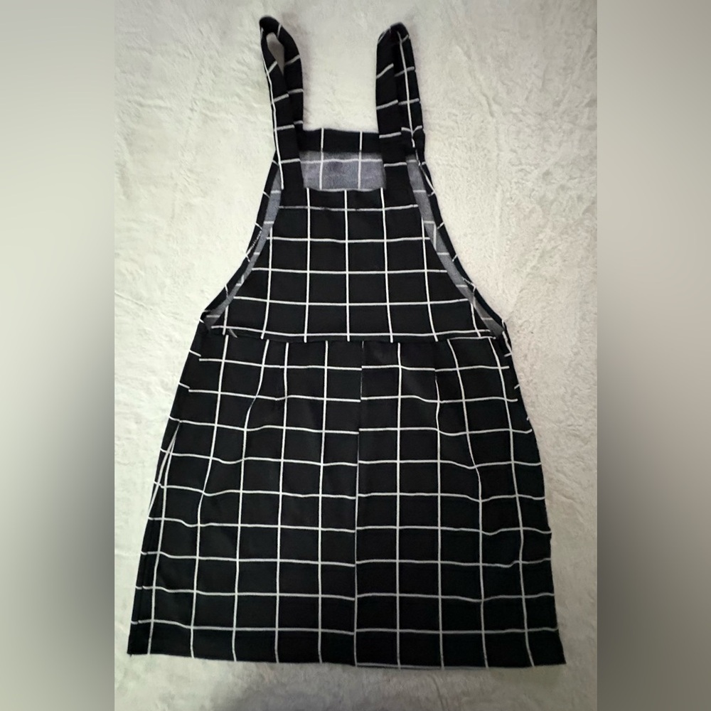 Black and white overall dress with pocket